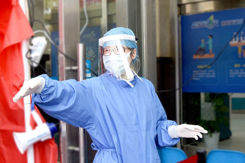 坚守前线杰出护士 7 许琴英_副本.jpg 坚守前线杰出护士 7 许琴英_副本.jpg